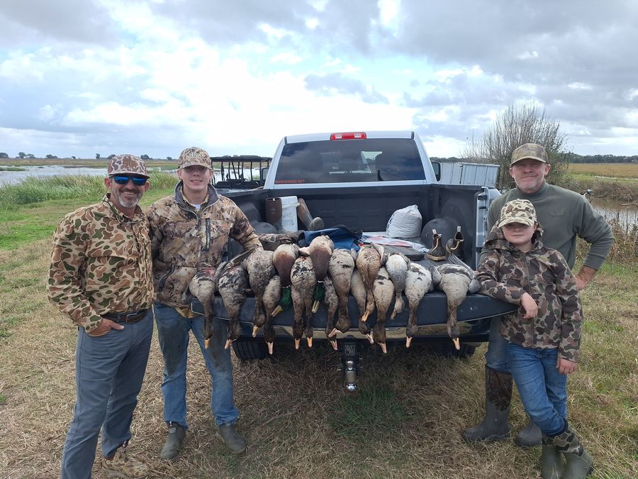 Hunters at the truck with a morning's ducks