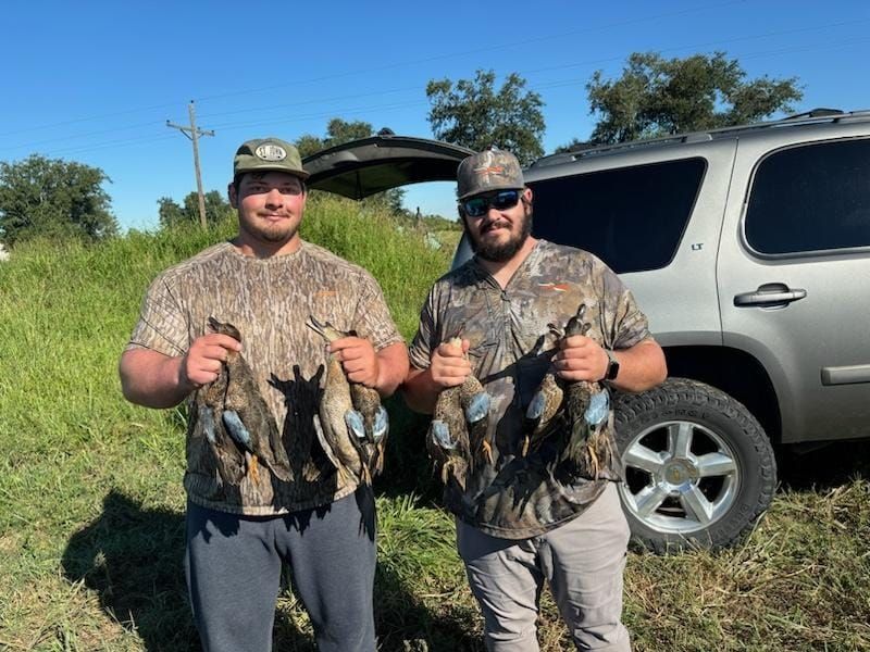 Teal hunters at the SUV