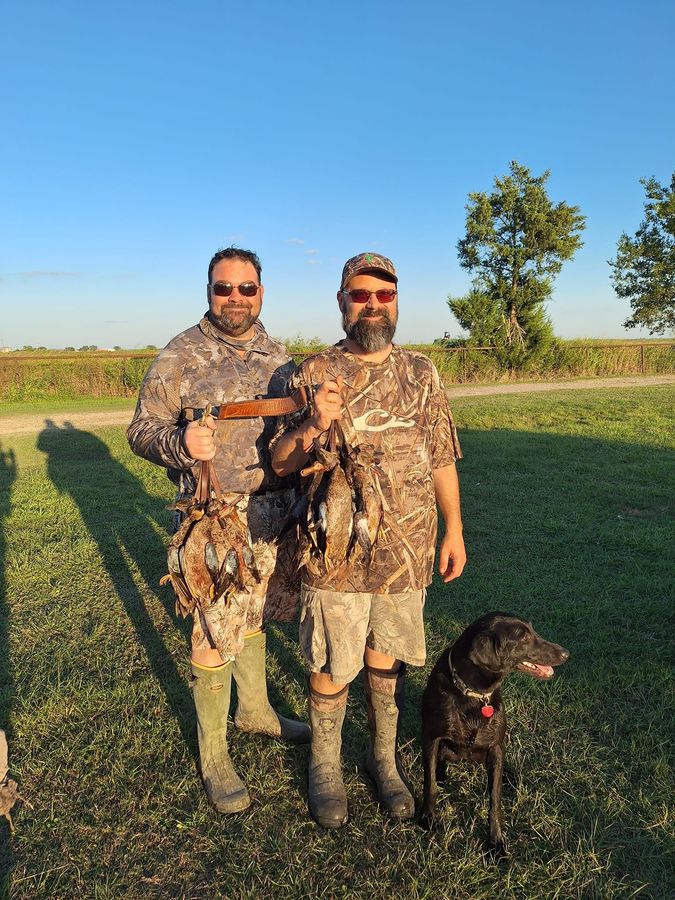 Hunters with a dog and a morning of teal