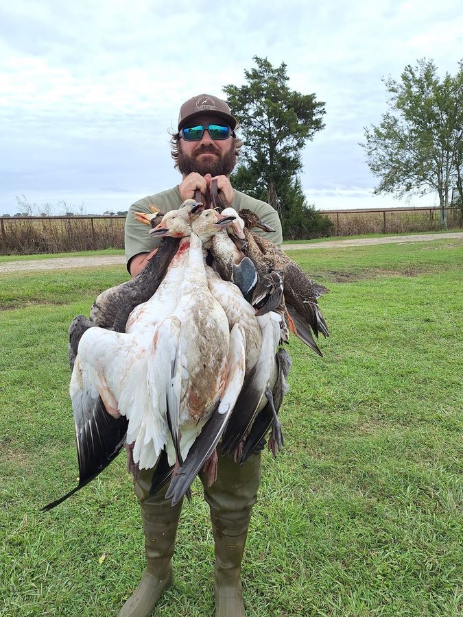 Hunter with a South Louisiana specklebelly goose